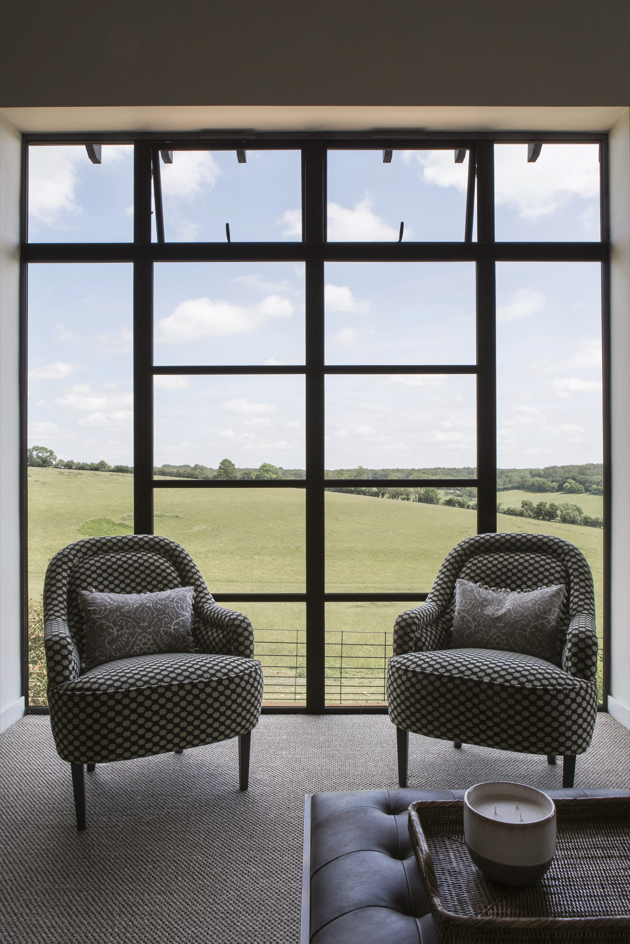 Living room double height window feature design
