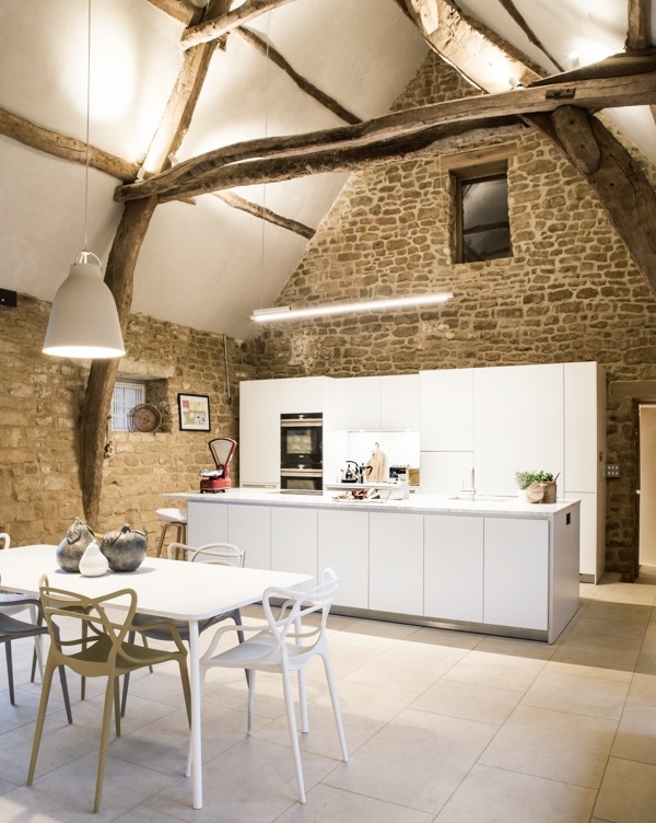 Exposed stone luxury double height barn conversion original timber beams