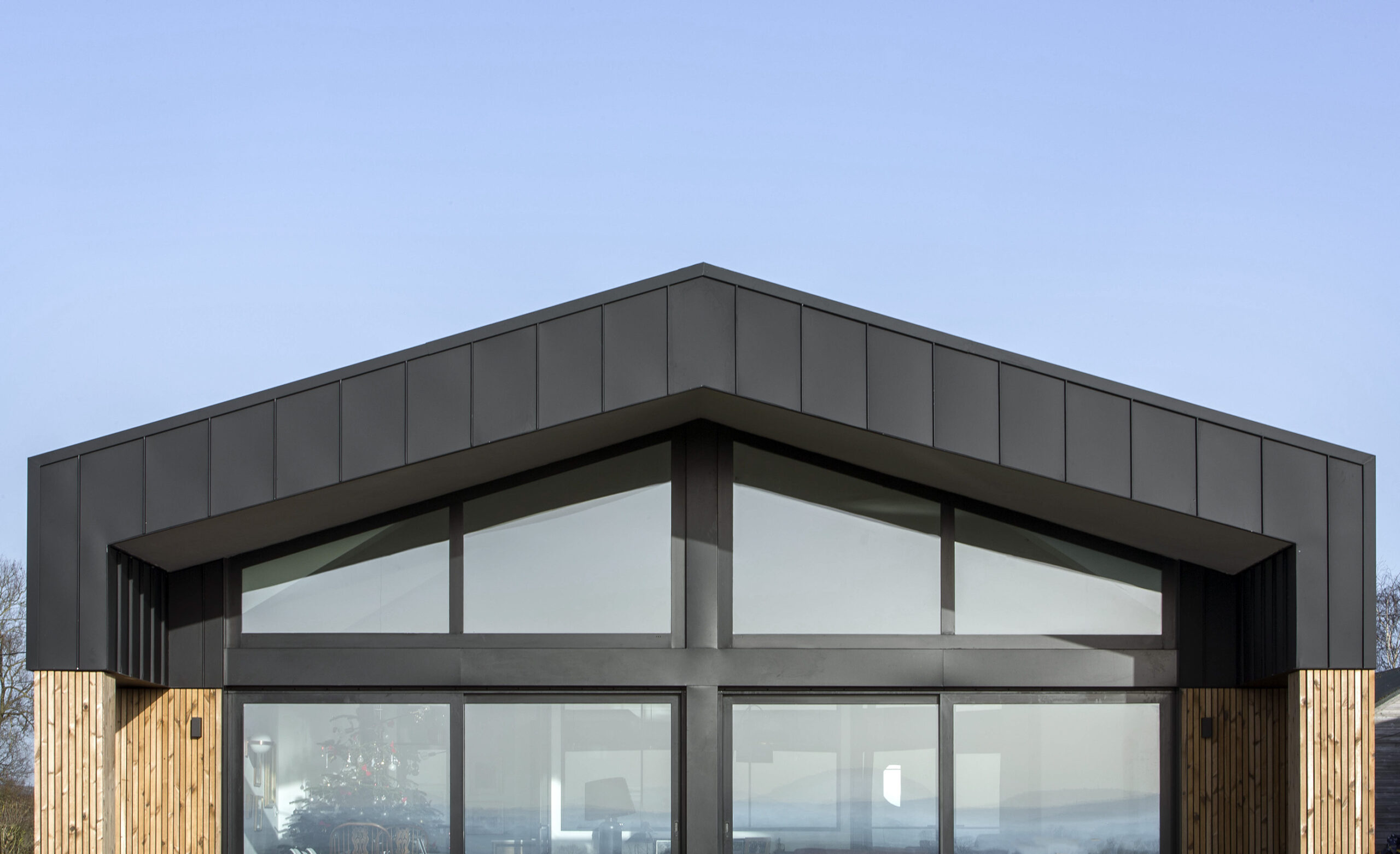 Aluminium sustainable cladding to modern barn conversion project in home counties