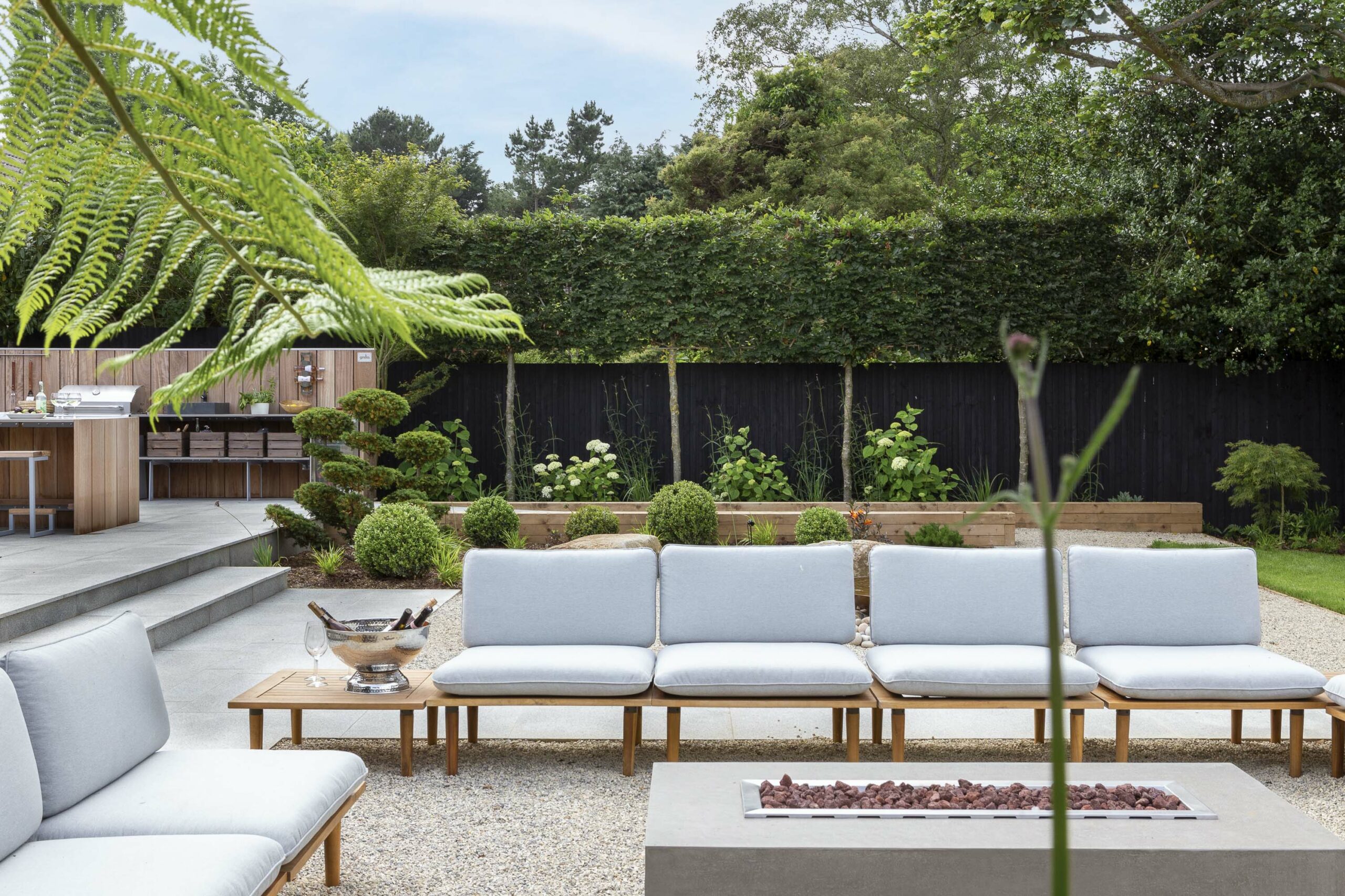 Garden lounge seating area with fire pit