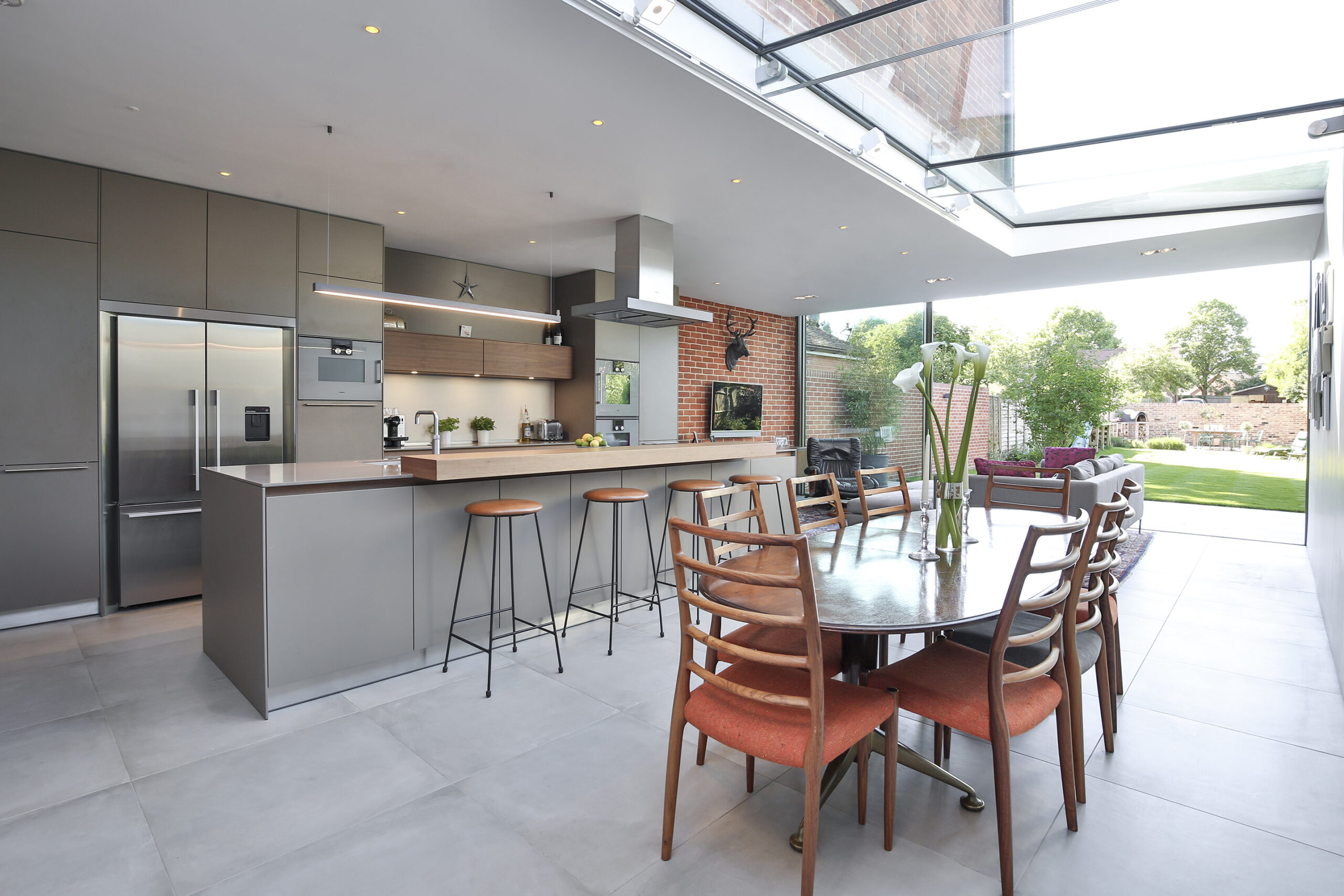 Open plan rear renovation frameless rooflight kitchen design