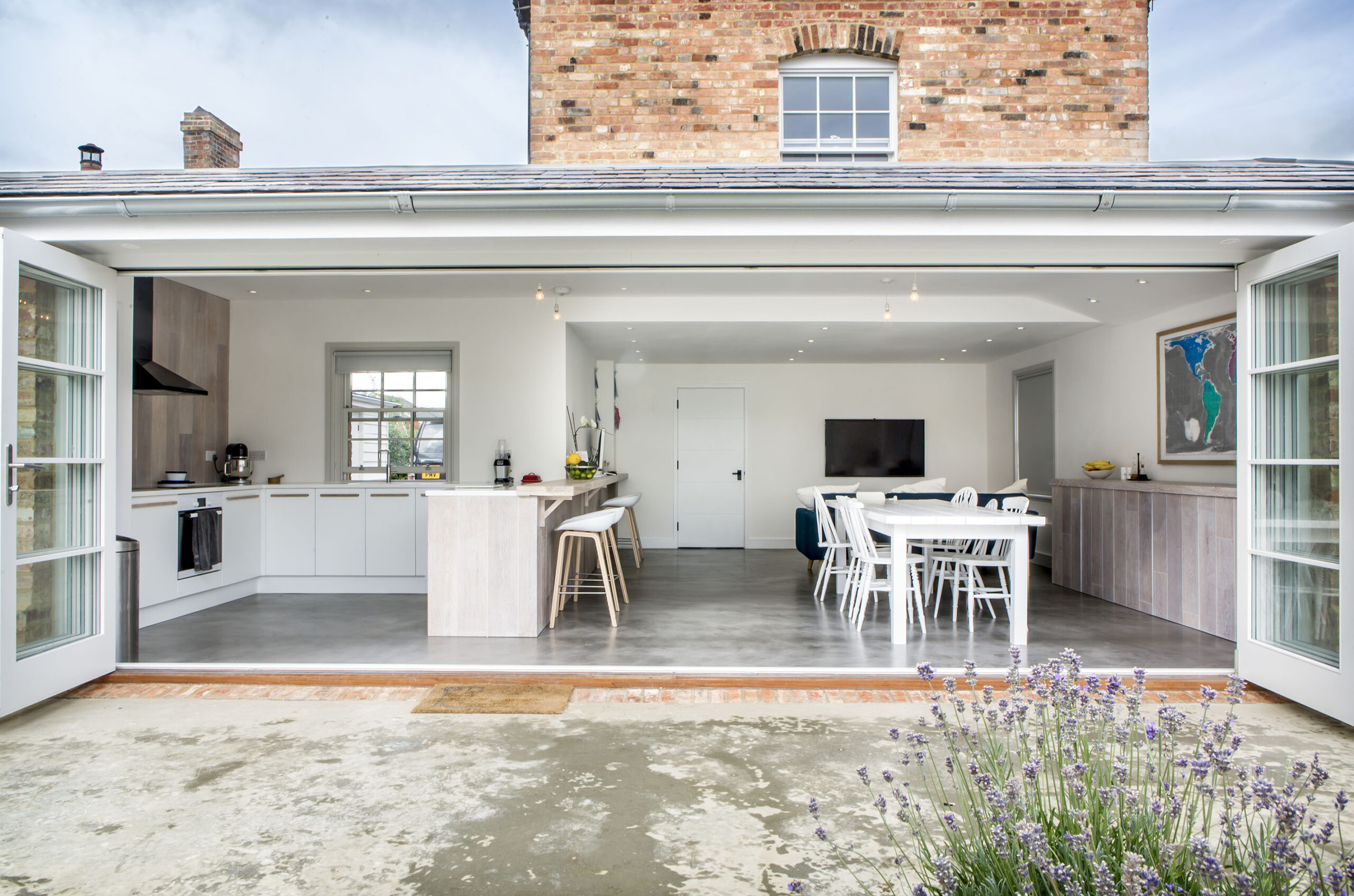 Rear extension for seamless indoor outdoor living