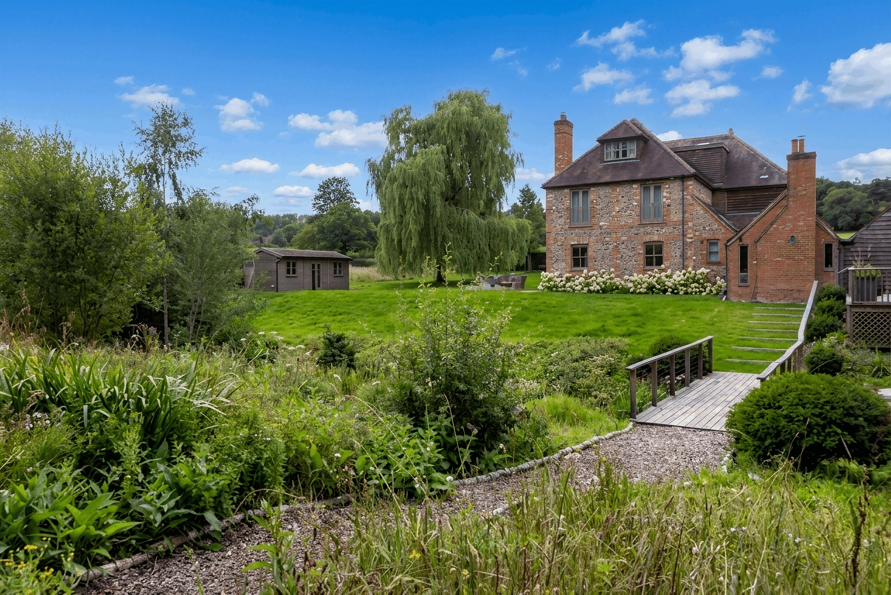 Beautiful timber sliding deck and cantilevered bench garden design