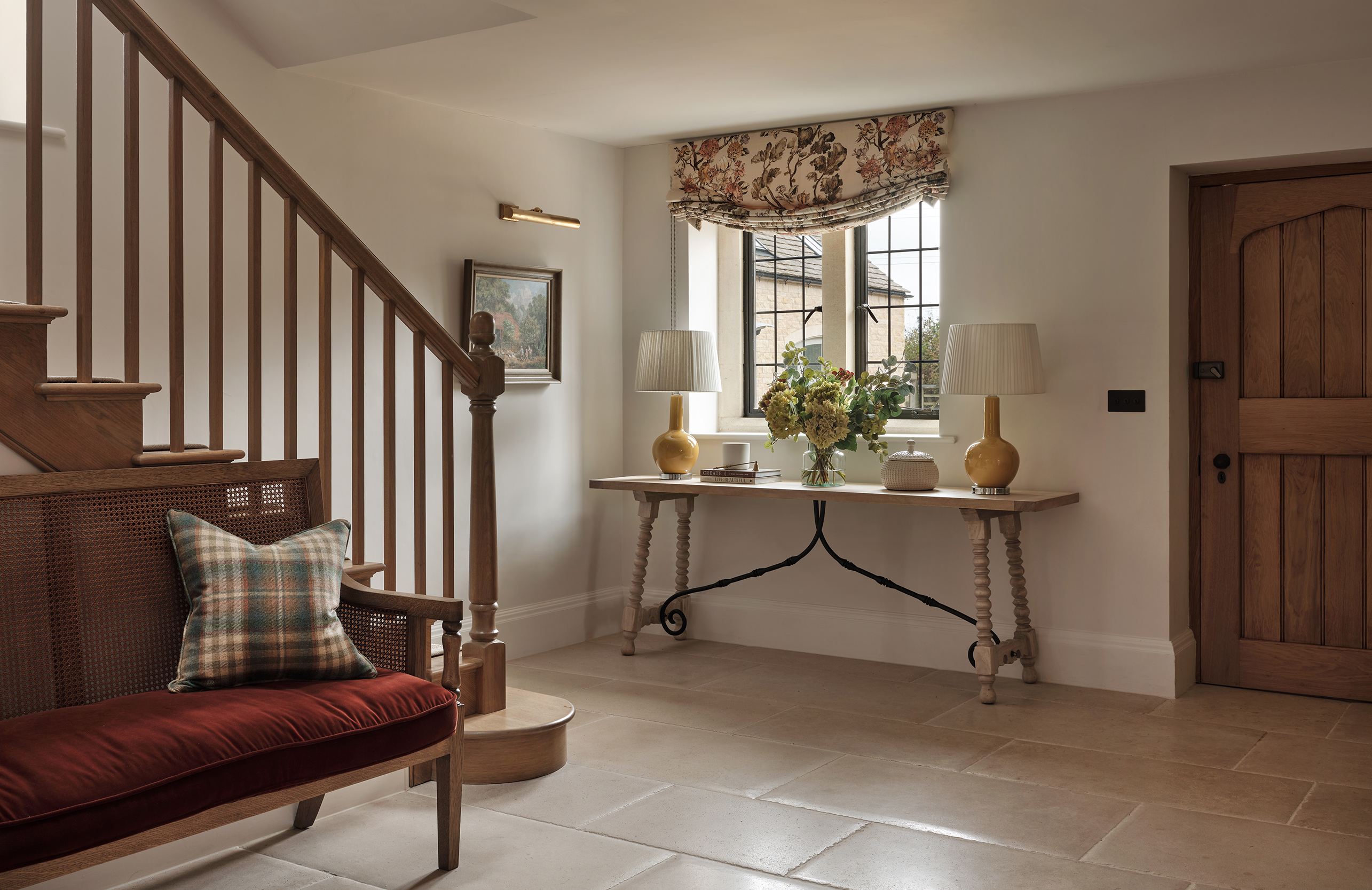 Entrance hall features a grand staircase