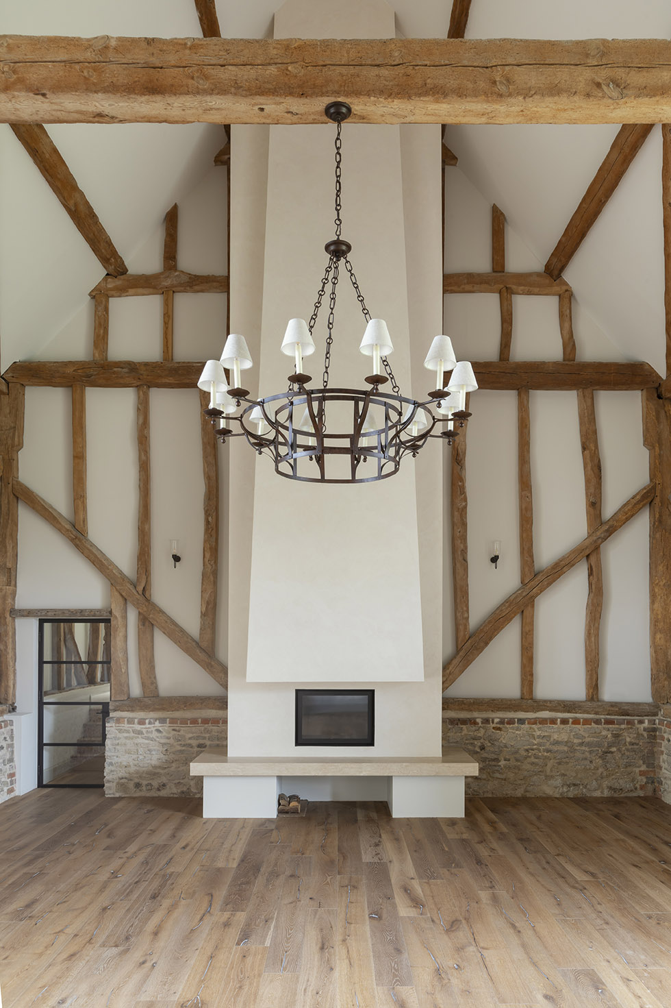 Dramatic double height living space with exposed beams by HollandGreen